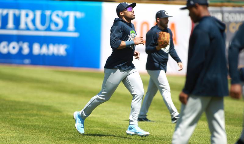 Kane County Cougars outfielder Jonah Davis warms up with the team during media day at Northwestern Medicine Field in Geneva on Monday, May 6, 2024.