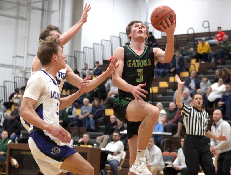 Crystal Lake South’s Colton Hess takes the ball to the hoop against Lake Zurich in Hinkle Holiday Classic boys basketball tournament game action at Jacobs High School Wednesday.