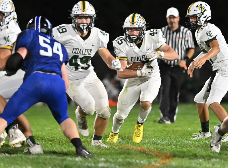 Coal City's Landin Bensen runs the ball during a conference game against Peotone on Friday, Sep 27, 2024 at Peotone. (Dean Reid for Shaw Local News)