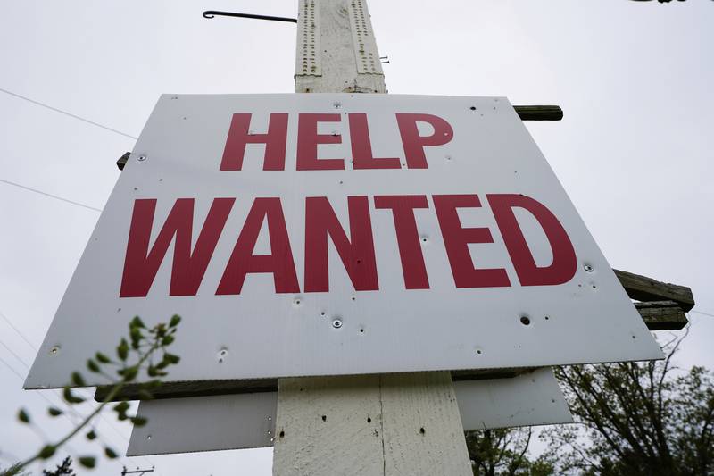 FILE - A help wanted sign is posted in Lansdale, Pa., Friday, April 28, 2023. (AP Photo/Matt Rourke, File)