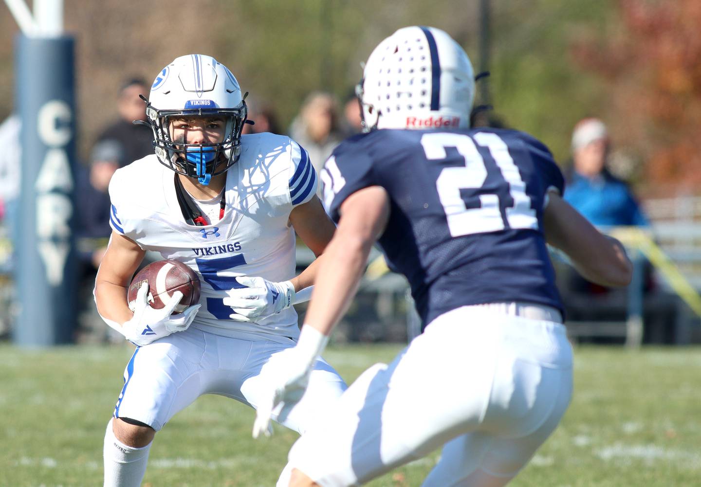 Geneva’s Dylan Reyes looks for running room in IHSA Class 6A quarterfinal playoff football action at Cary Saturday.