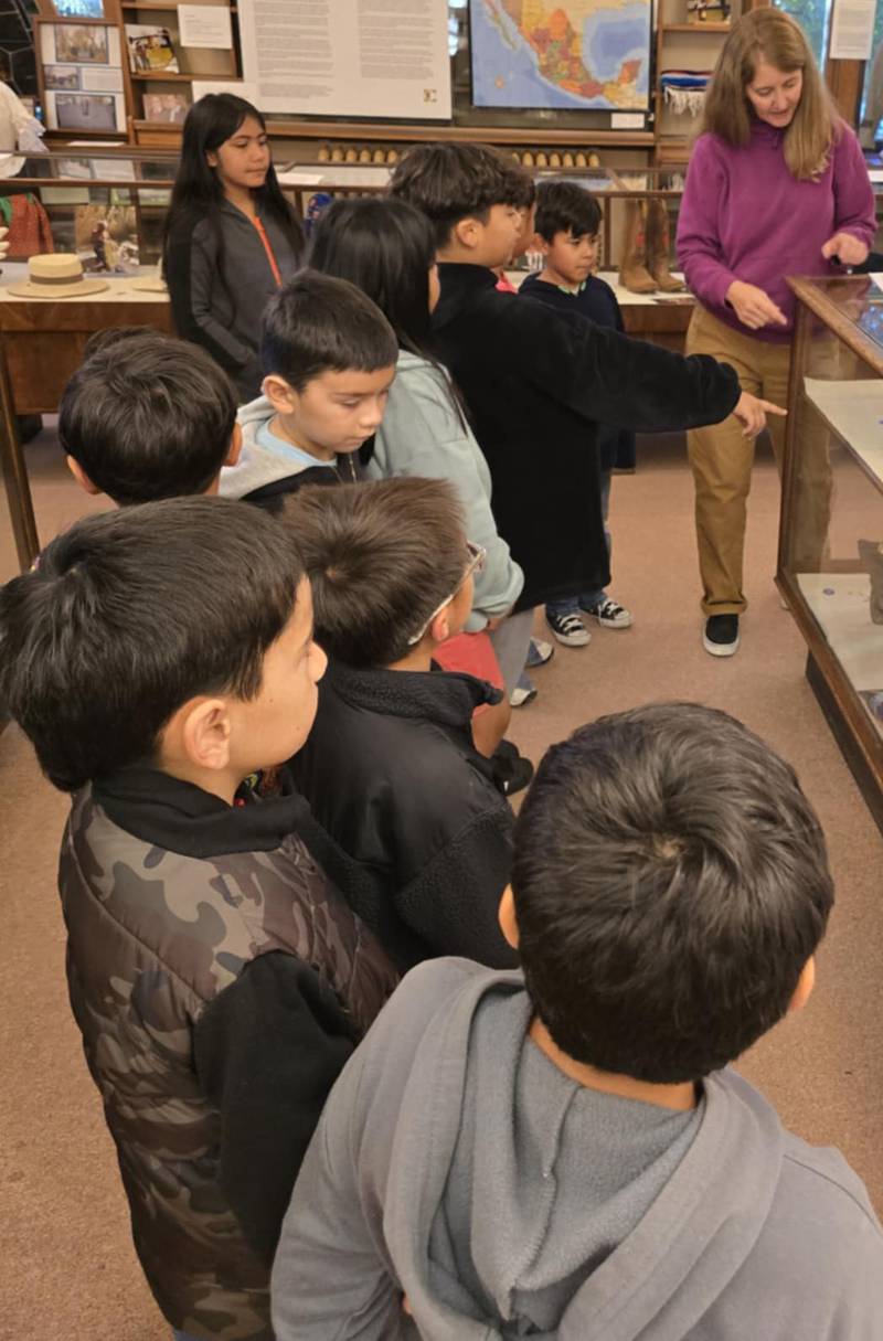 Lincoln Elementary School students learning about making traditional tortilla tools