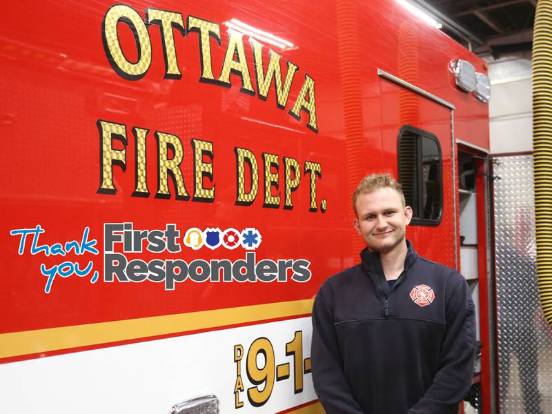 Ottawa firefighter and paramedic Adrian Banat, poses for a photo a photo at the Ottawa Fire Station off of State Street on Thursday, April 18, 2024 in Ottawa.