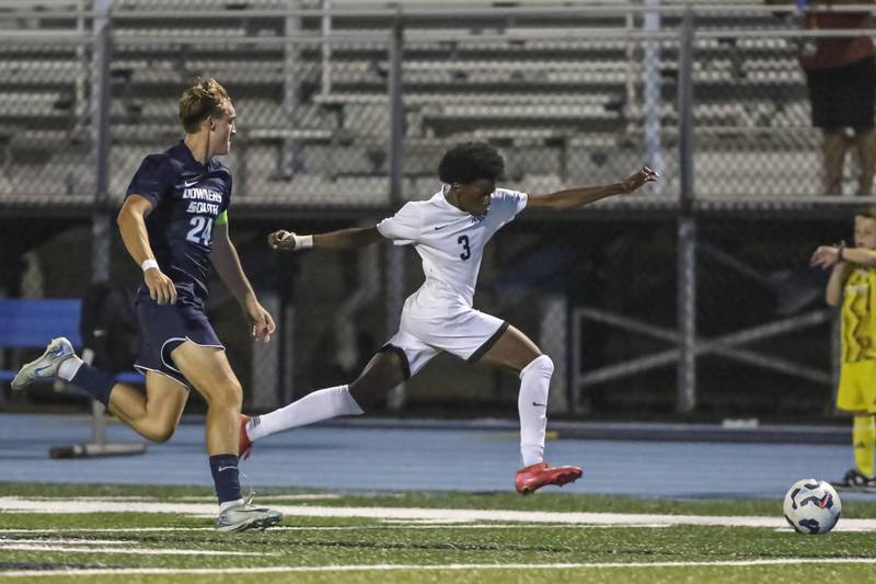 Downers Grove North's Boonie Ford (3) races down the sidelines of the pitch during soccer match between Downers Grove North at Downers Grove South. Oct 2, 2025.