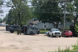 Police, armored vehicle surround home in McHenry; authorities ask people to avoid the area