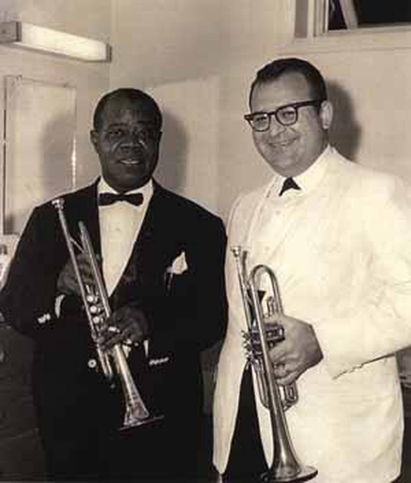 Louis Armstrong (left) and Ron Modell, founder and former director of the Northern Illinois University Jazz Ensemble, are pictured in 1966 at the Pines Hotel in South Fallsburg, N.Y., where both were appearing.