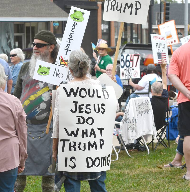 There were a variety of signs carried by demonstrators on Saturday, Oct. 18, 2025 at the No Kings rally on the Ogle County Courthouse square in Oregon, Illinois to protest actions and decisions by President Donald Trump and his administration.