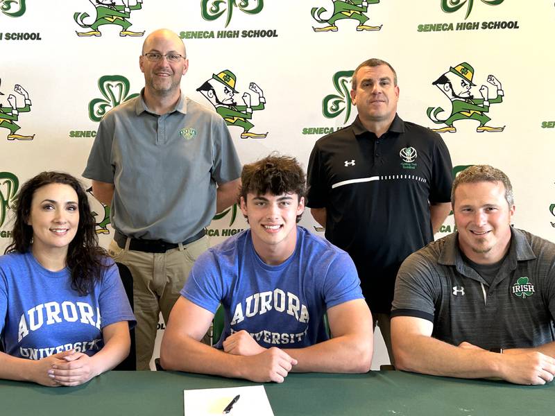 Seneca’s Kysen Klinker has signed to continue his education in-state at Aurora University and his football career at the NCAA Division III level with the Spartans. Klinker, a standout tight end/linebacker for the Fighting Irish and second-team member of the 2023 Times All-Area Football Team, is pictured here at his signing ceremony. From the left are: in front – Tara Castleberry, Kysen Klinker and Terry Maxwell; in back – Levi Derber and Ted O’Boyle.
