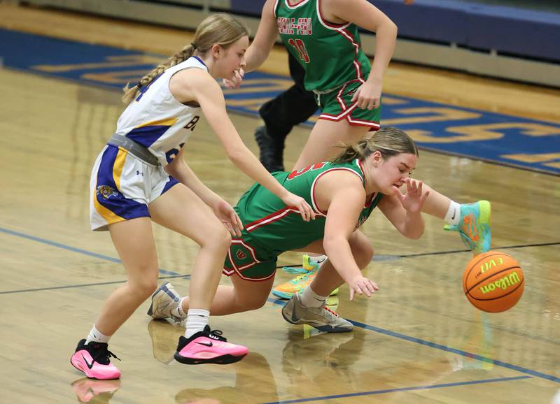 Somonauk-Leland's Alexa Larsson (left) and La Salle-Peru's Emma Jereb go after a loose ball during their game Thursday, Nov. 20, 2025, in the Tim Humes Breakout girls basketball tournament at Somonauk High School.