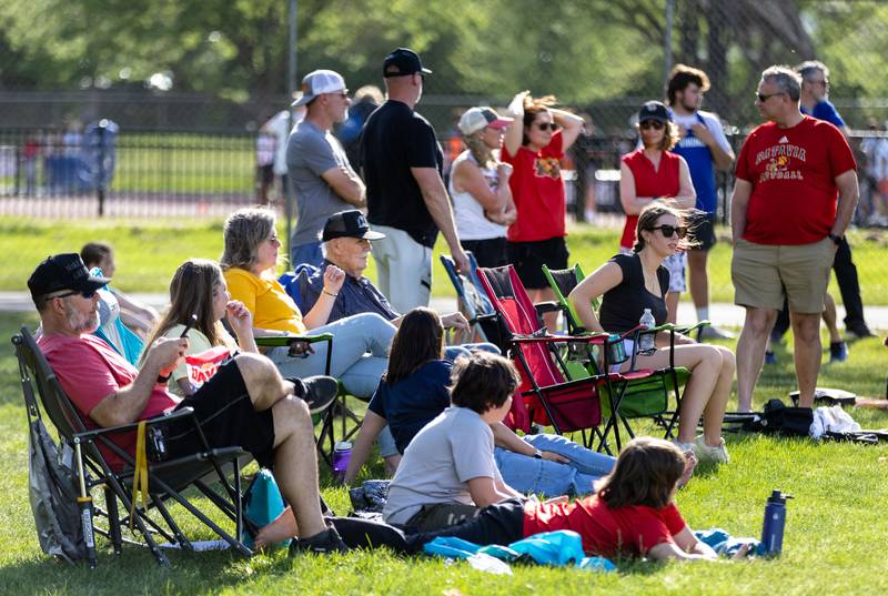 Spectators watch the varsity discus finals during the Dukane Conference Boys Track Meet hosted by Lake Park High School in Roselle on Friday, May 16, 2025.