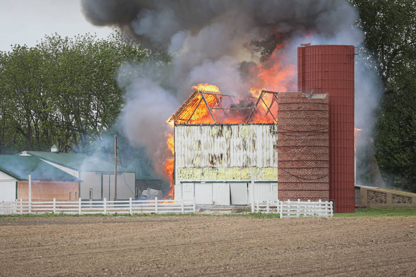 A barn was consumed by fire near Huntley Friday, May 22, 2026.