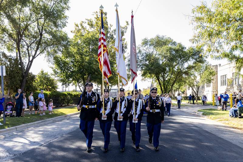 Members of the JROTC kick things off during the Joliet Central homecoming parade on Sept. 27. 2025.