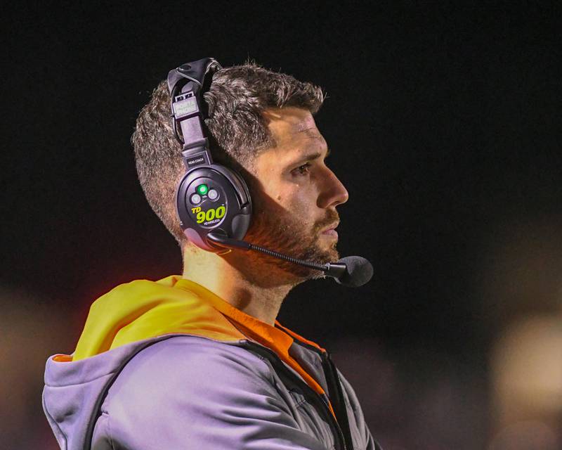 DeKalb's head coach Derek Schneeman looks on during the game on Friday Oct. 4, 2024, while taking on Andrew High School held at DeKalb High School.
