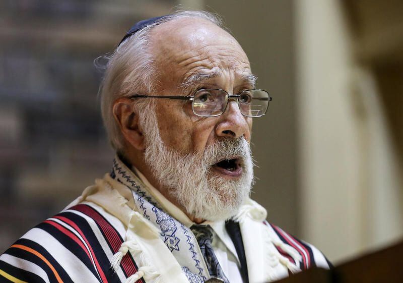 Rabbi Charles Rubovits leads an interfaith prayer service Friday at the Joliet Jewish Congregation Joliet to honor the 11 people who were killed at the Tree of Life Congregation in Pittsburgh.