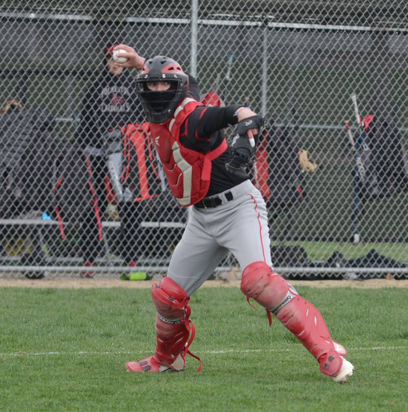 Forreston's Carson Akins gears up to throw to fiirst for an out during a Saturday, April 20, 2024 game with Winnebago at Forreston High School. The Cardinals won the game 11-2.