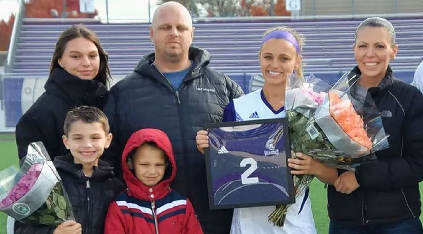 Three members of the Roberts family were wounded during Monday's Highland Park shooting, 8-year-old twins Luke and Cooper, bottom left, and their mother Keely, far right. Also pictured are sisters Emily and Ella Roberts, far left and second from right, and their father, Jason, second from left.