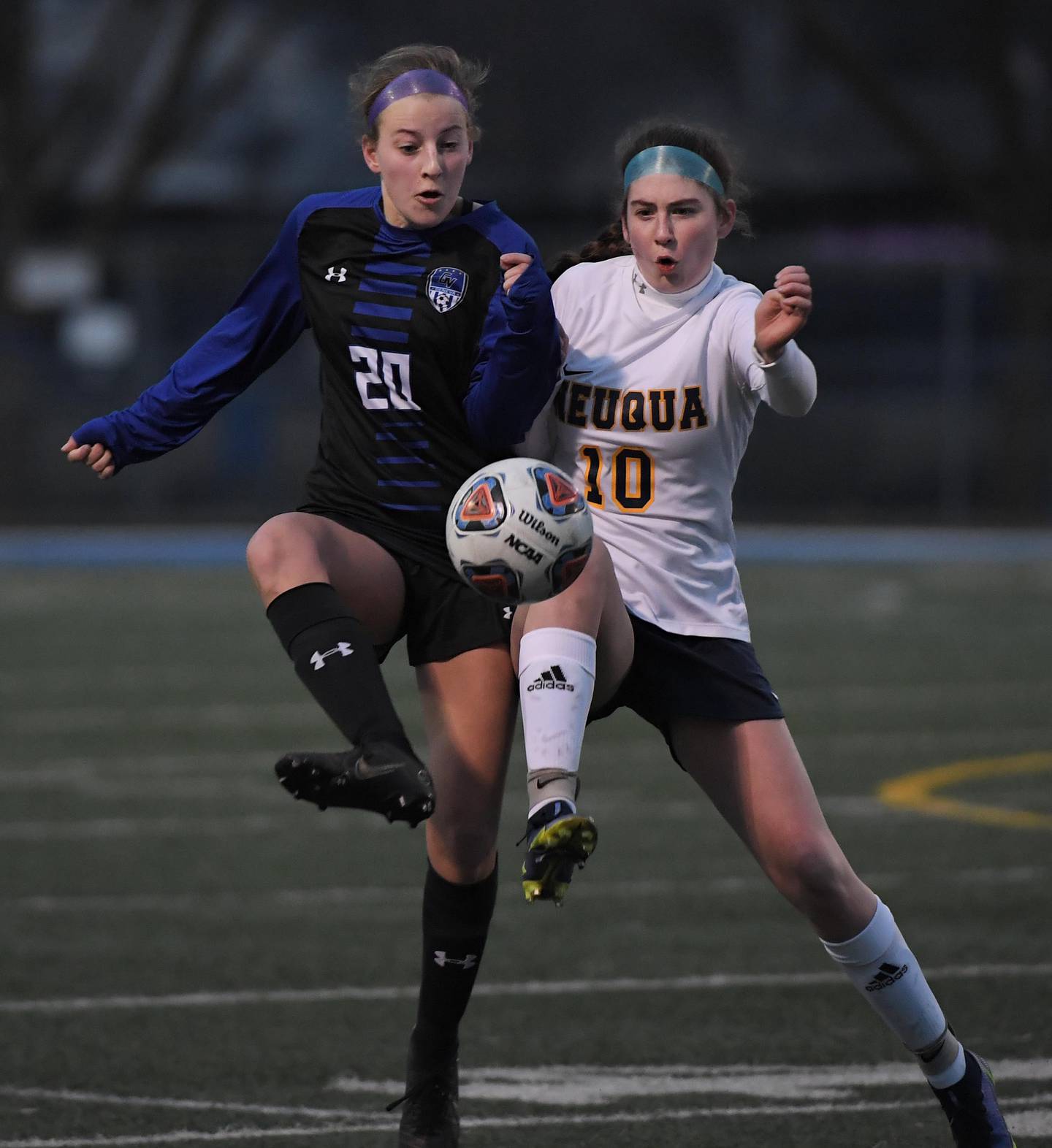 Geneva’s Caroline Madden and Neuqua Valley’s Alexis May compete for the ball in a girls soccer game in Geneva on Thursday, March 23, 2023.