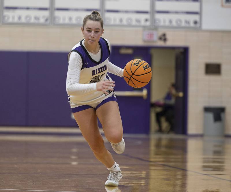 Dixon's Reese Dambman handles the ball against Morris Friday, Jan. 3, 2025, at Dixon High School.
