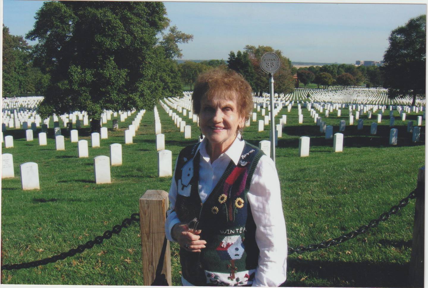 Marie Pometto Chase, the first woman from La Salle County to enlist in the U.S. Navy during World War II, stands in front of Arlington National Cemetery during a visit honoring fellow service members.
