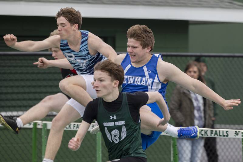 Runners clear the first hurdle in the 110 hurdles Friday, April 25, 2025, during the Rock Falls Rocket Invite.