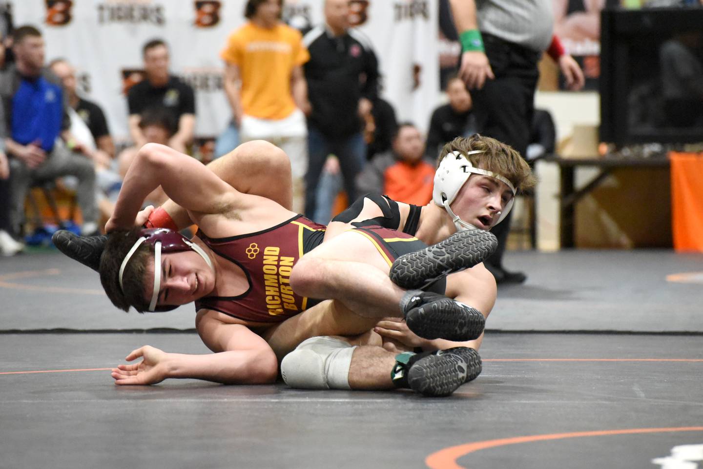Erie's Wyatt Goossens (back) wrestler Richmond-Burton's Emmett Nelson in the 144 pound weight class at the Class 1A Byron Sectional on Saturday, Feb. 10.
