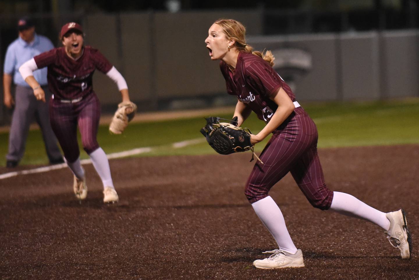 Lockport's Kelcie McGraw, right, and Addison Way react after defeating Bradley-Bourbonnais 2-0 in the Class 4A Illinois Wesleyan Supersectional Monday, June 9, 2025.
