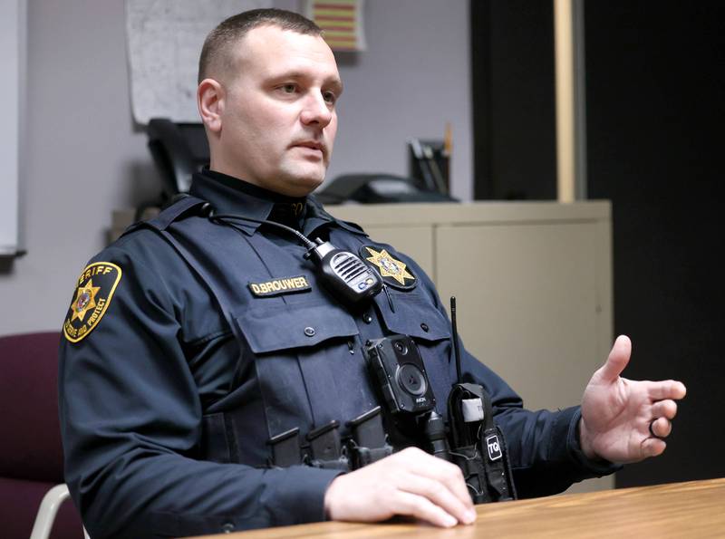 DeKalb County sheriff's deputy Doug Brouwer shows one of the Narcan sprays he carries at all times during a discussion about the opioid overdose treatment Friday, March 22, 2024, at the Sheriff’s Office in Sycamore.