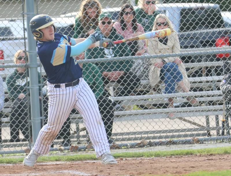 Marquette's Braxton Nelle watches the ball travel into the outfield after getting a hit on Tuesday, April 28, 2026 at Masinelli Field in Ottawa.