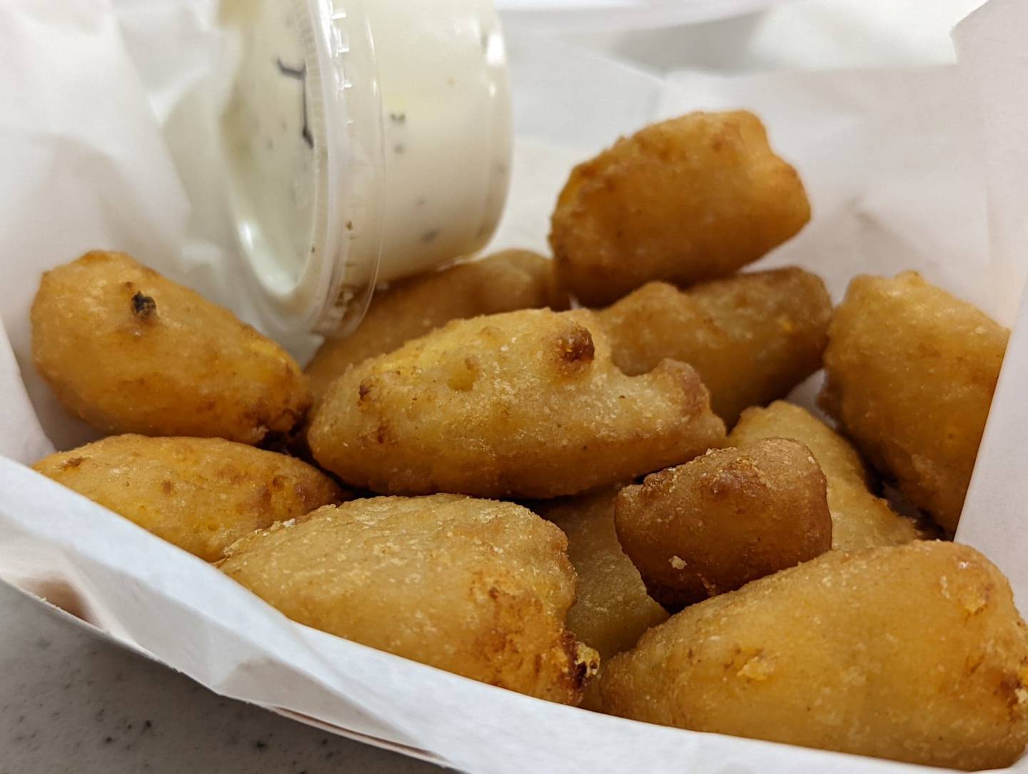 The Knights of Columbus Holy Trinity Council No. 4400 on Joliet's East side offer a choice of four different appetizers at its fish fries, all for $7.95 each: mozzarella sticks with marinara sauce, onion Rings, fried mushrooms and macaroni and cheese bites. Pictured are the macaroni and cheese bites.