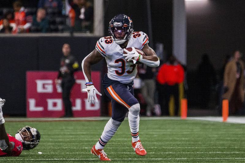 Chicago Bears cornerback Jaylon Johnson advances a fumble recovery during the first half against the Atlanta Falcons, Sunday, Nov. 20, 2022, in Atlanta.