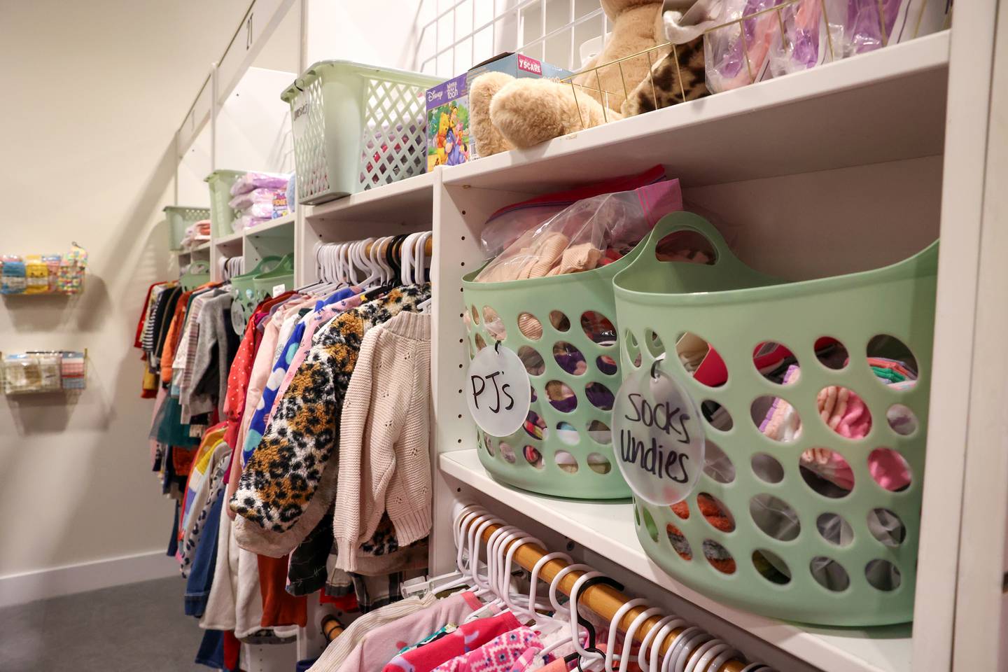 Items fill the numerous racks and shelves at the new location for Georgie's Closet, a not-for-profit dedicated to providing clothing, toys and necessities to area foster children and families, during the location's grand opening on Bradley Blvd. in Bradley on Monday, Dec. 1, 2025.