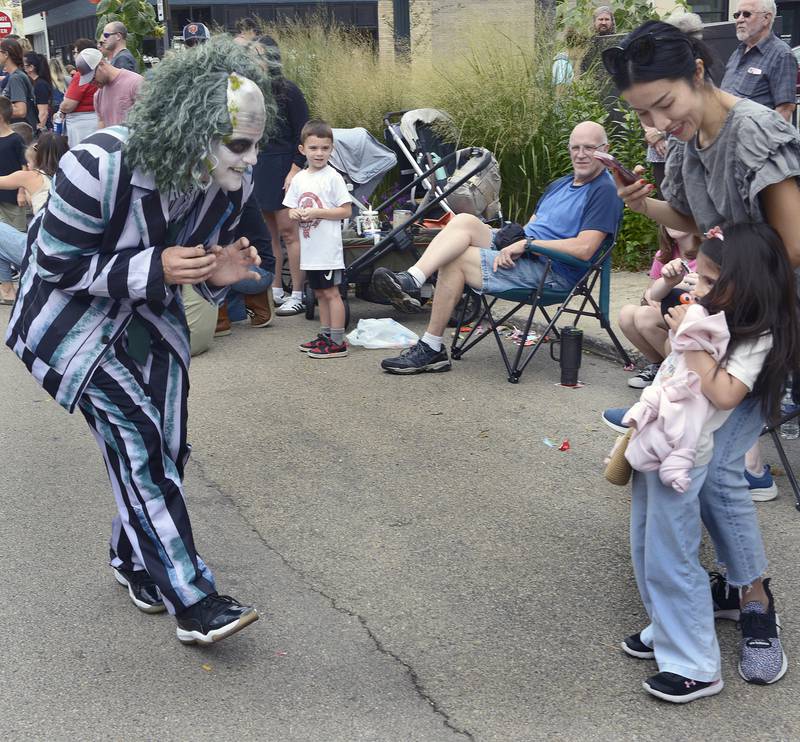 Beetlejuice took time out of his busy schedule to greet and perhaps frighten some along the parade route Sunday, Sept. 29, 2024, during Ottawa’s Fall Fest Parade.