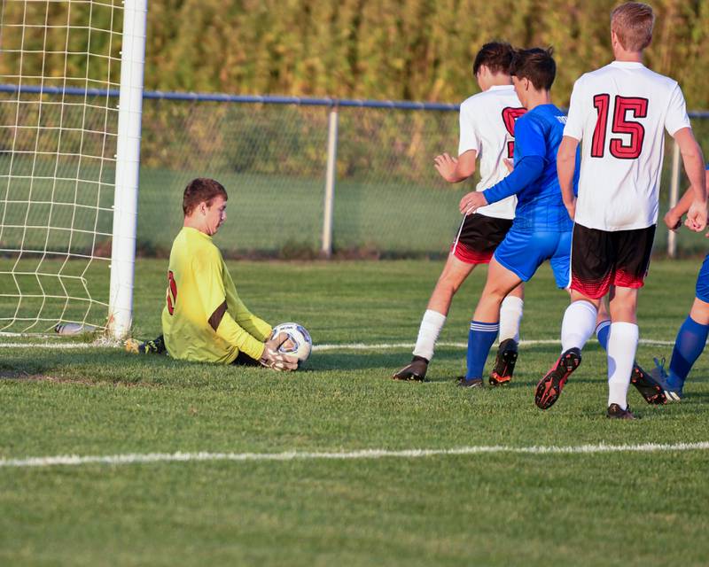 Indian Creek's Lucas Odle, left, kicks the ball away from Hinckley-Big Rock's Jacob Orin in the first half of the game Monday Sept. 26th held at Hinckley-Big Rock High School. goalie Jacob Coulter makes a save in the first half of the game against Hinckley-Big Rock Monday Sept. 26th at Hinckley-Big Rock High School.