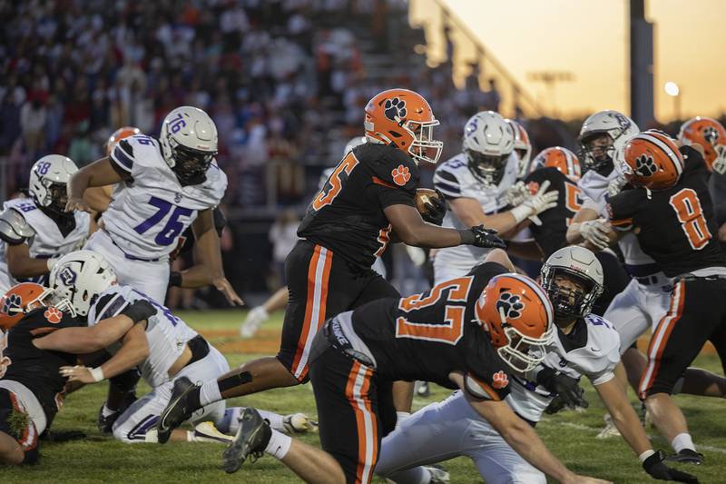 Byron’s Kaden McGough runs the ball against Dixon Friday, Sept. 5, 2025, at Byron High School.