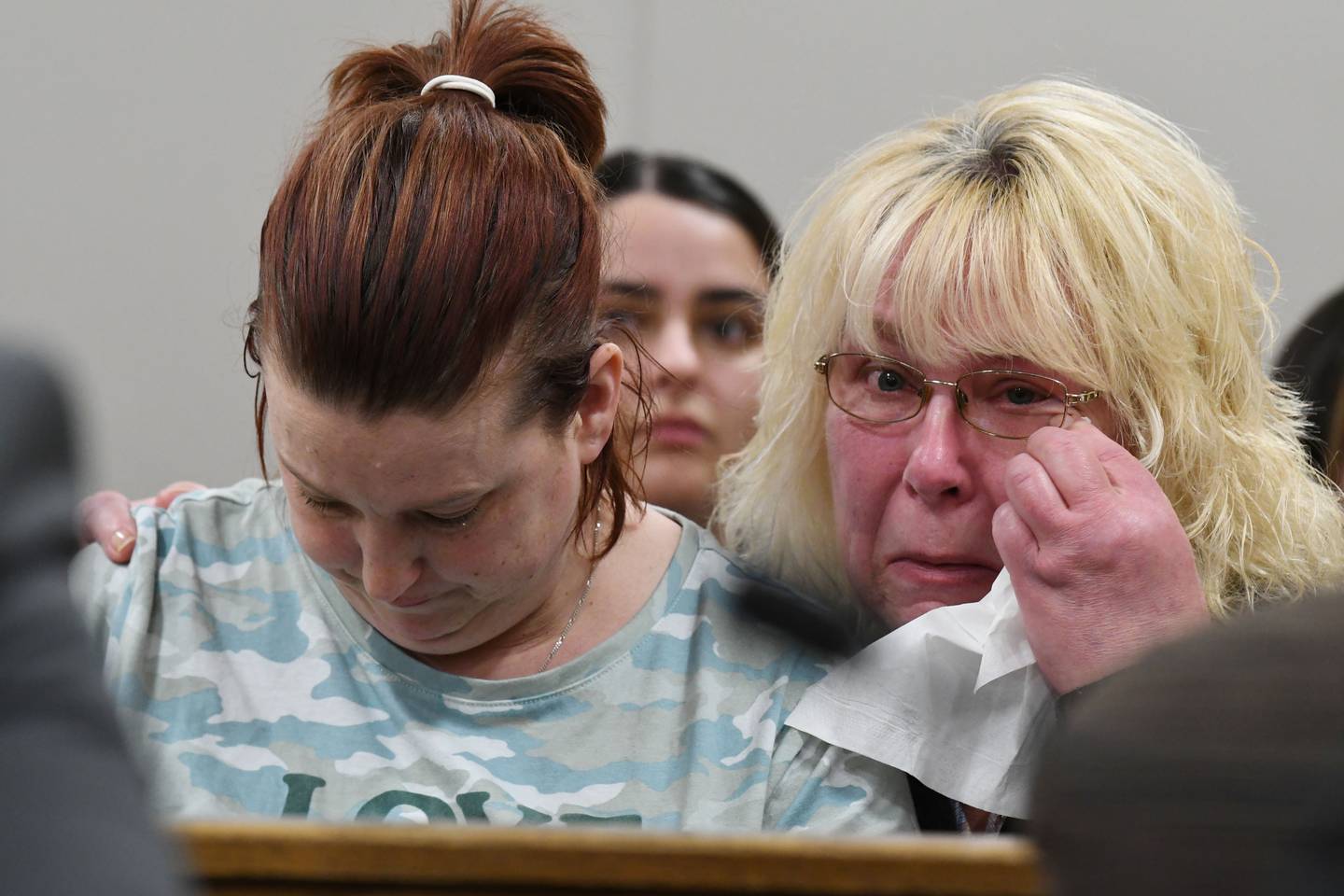 Peggy Lynn Johnson-Schroeder's sister Spring Leslin, left, and aunt Ginny Schroeder react after Linda La Roche is found guilty Wednesday, March 16, 2022, on both counts by a Racine County jury. La Roche, formerly of the McHenry area and, before her arrest in 2019, Florida, was charged with first-degree intentional homicide and hiding a body in the 1999 slaying of Peggy Lynn Johnson-Schroeder.
