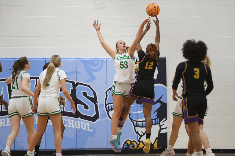 Providence’s Landrie Callahan blocks a shot against Thornton Fractional North in the Class 3A Hillcrest Sectional semifinal game on Tuesday, Feb. 24, 2026 in Hillcrest.