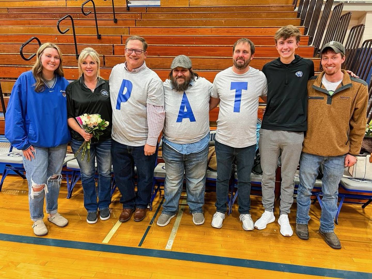 Friends of Pat Mason, who passed away suddenly on Monday, came out to support the Mason family at Friday's Princeton Tigers basketball game. Pictured are Emma (Mason) Steward, Heather Mason, Trent Goodale, Jason Allen, Ian Cardosi, Jackson Mason and Austen Steward.