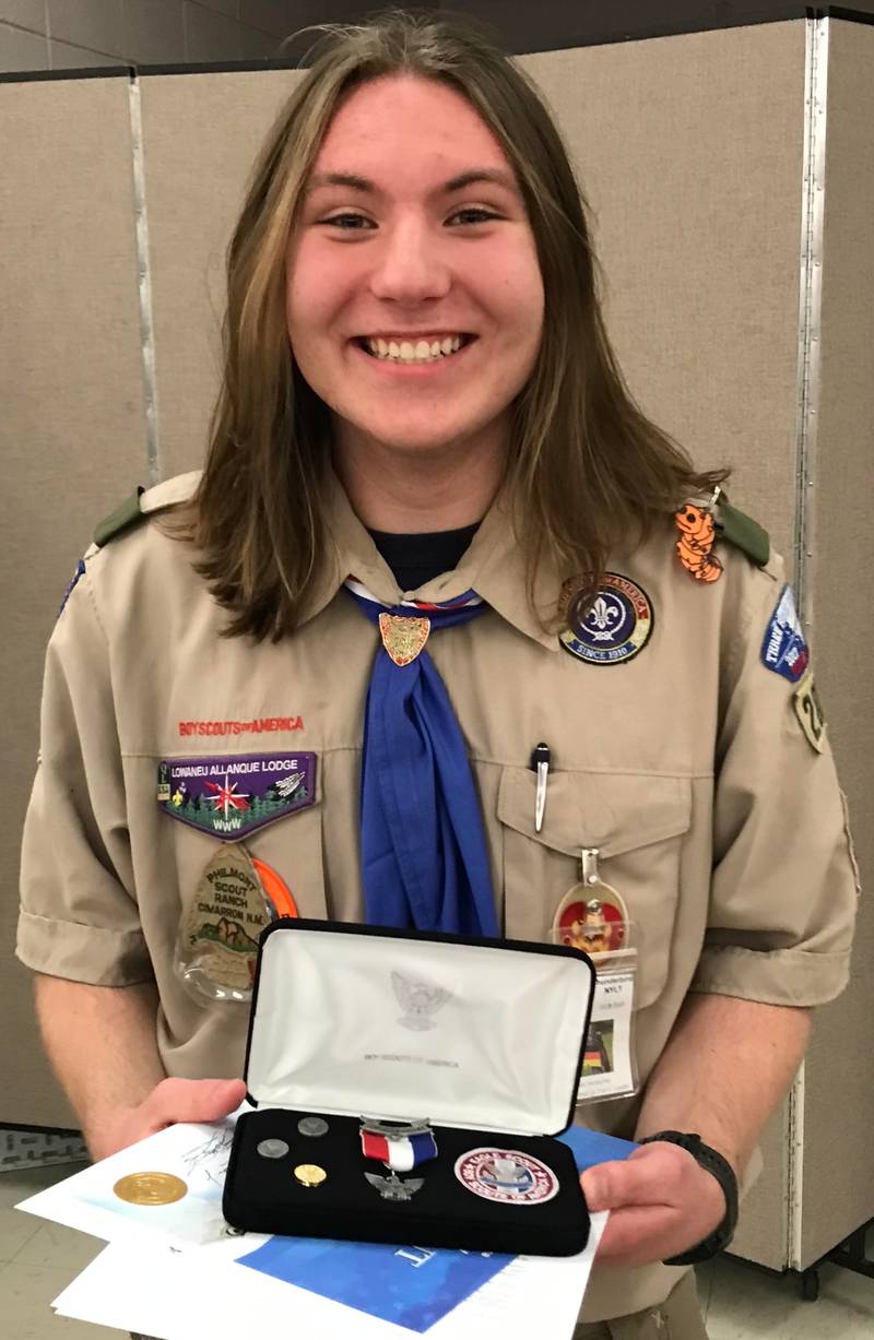 Boy Scout Troop 2810 member William Hentschel with the Eagle Scout Award