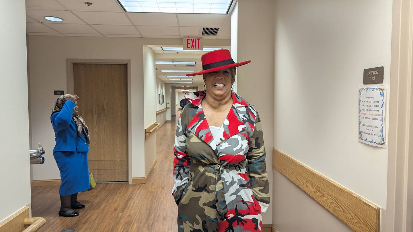 Lisa Parham, activities director at Joshua Arms Senior Residences in Joliet, plans to participate in Joshua Arms' first fashion and talent show on Friday. Parham is seen on her way to the pre-show photo shoot on Friday, April 18, 2025, at Joshua Arms Senior Residences in Joliet.