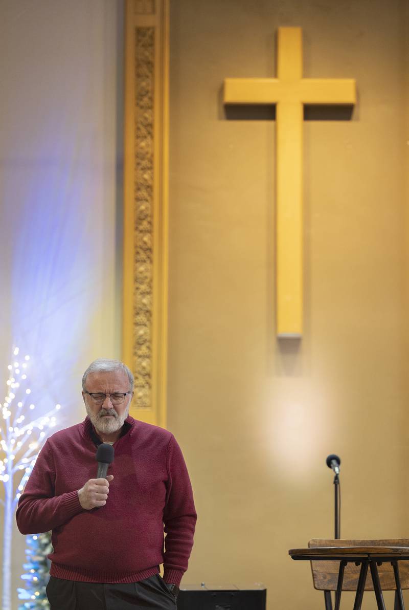 Pastor Dennis Owens holds the opening prayer Sunday, Jan. 19, 2025, at the Church of the Nazarene in Sterling. The Sauk Valley Diversity Alliance held their annual Dr. Martin Luther King Jr. Peace and Justice Celebration at the church in recognition of the civil rights leader.