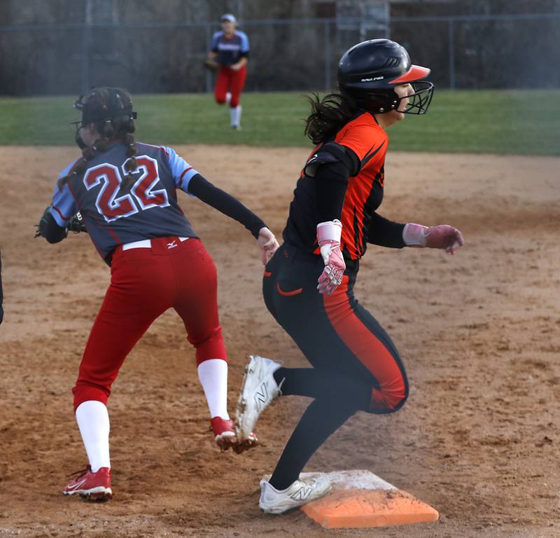 Crystal Lake Central's Ella Arana legos out a hit to start the eight inning during a nonconference softball game against Marian Central on Thursday, April 3, 2025, aat bates Park in Woodstock.