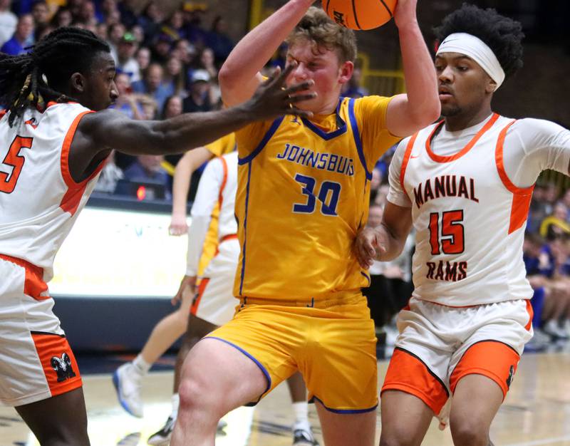 Johnsburg’s Jayce Schmitt moves the ball against Peoria Manual in boys IHSA Class 2A Supersectional basketball on Monday, Mar. 9, 2026, at Sterling High School in Sterling.