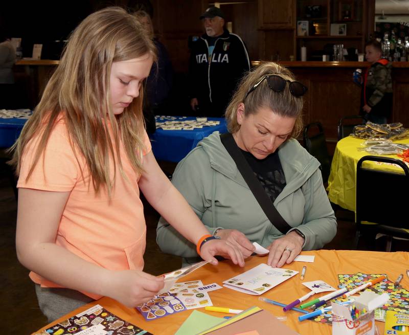 Lily and Jillian Pinks of Elburn make a card for Frankie Techter at the Be the Match Stem Cell Screening and Blood Donation Event at Elburn's Lion's Club that was held for Frankie Techter on Saturday, April 8, 2023.