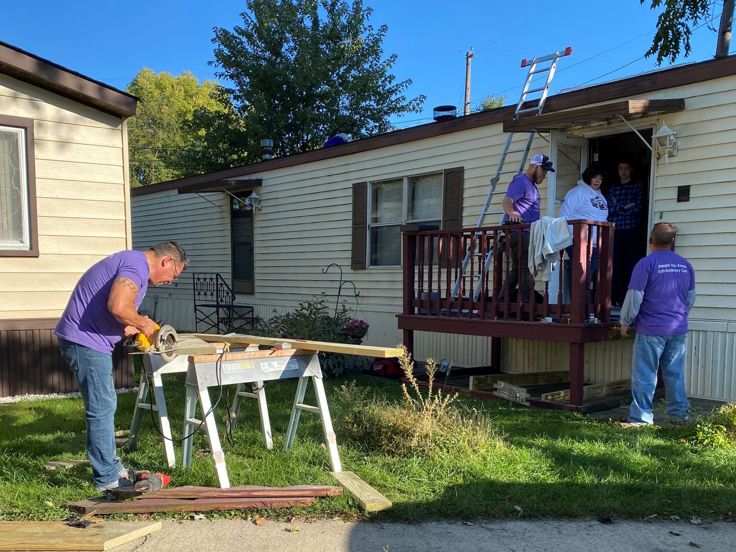Joe Limon prepares the pieces that will eventually become new stairs for Carmen Kirgan's home in Ottawa on Saturday.