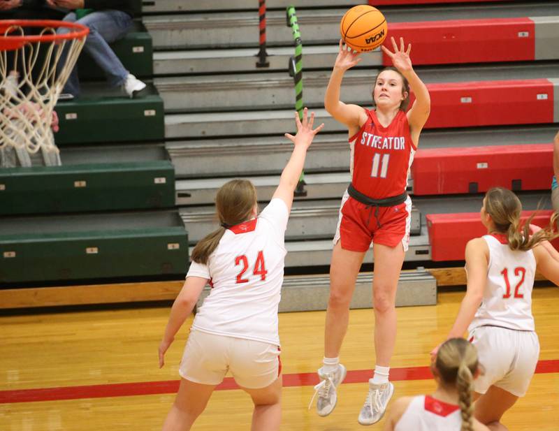 Streator's Ava Gwaltney shoots a jump shot over L-P's Madilyn Knowles on Tuesday, Jan. 28, 2025 in Sellett Gymnasium at L-P High School.