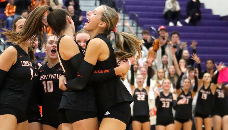Libertyville’s Wildcats celebrate a two-set win in an IHSA volleyball Class 4A Sectional Championship at Hampshire High School in Hampshire on Thursday, November 6, 2025.