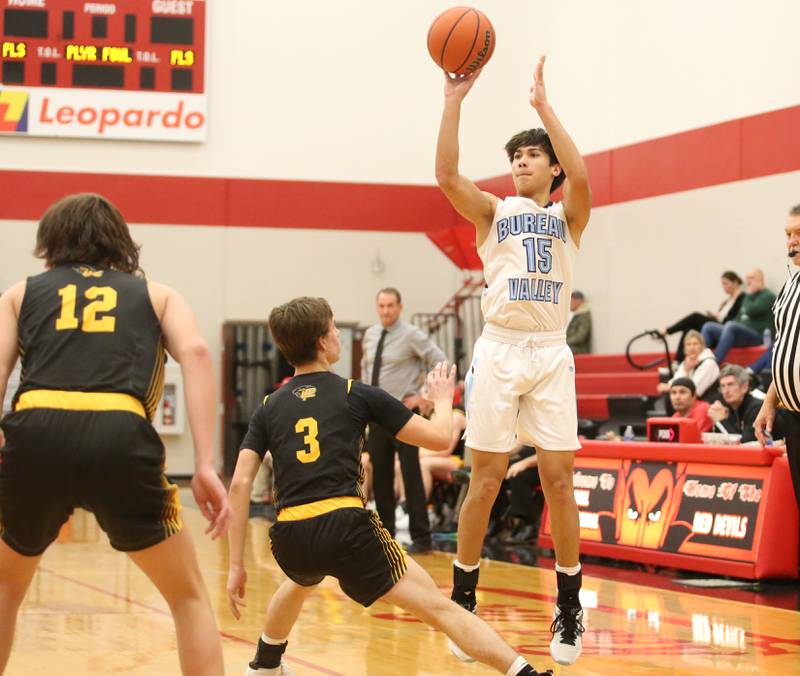 Bureau Valley's Corban Chhim shoots a jump shot over Putnam County's Bryce Smith during the 49th annual Colmone Class on Thursday, Dec. 7, 2023 at Hall High School.