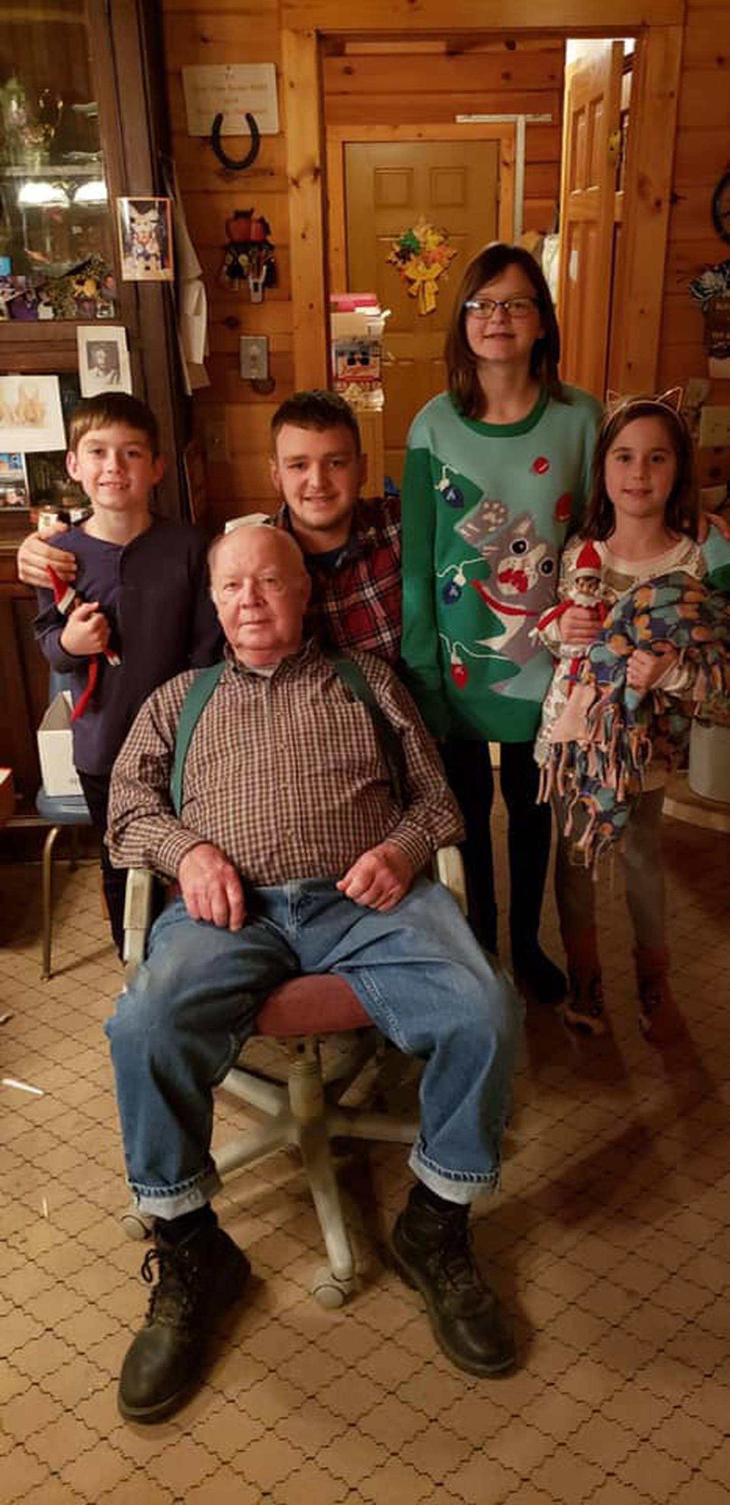 Jerry Taylor of Plainfield is pictured with his grandchildren. They are, from left: 
Linda Taylor's son Ethan Holms-Taylor, Roy Taylor's son Jerry William Taylor, Roy Taylor's daughter Mallory Taylor, and Linda Taylor's daughter Emma Holmes-Taylor.