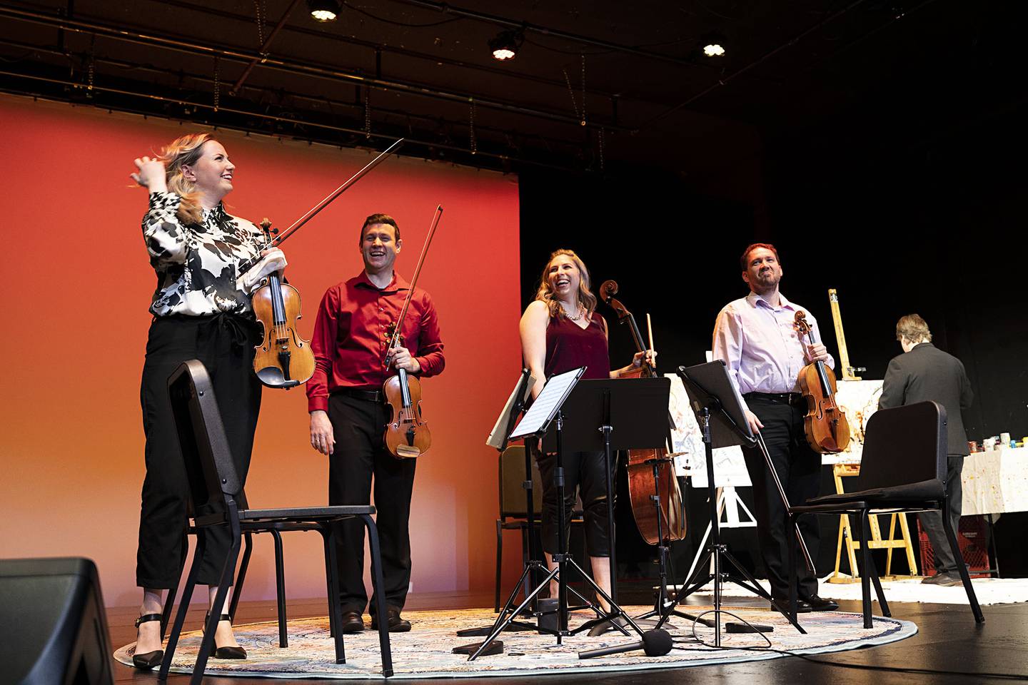 Kontras String Quartet members, from left, Eleanor Bartsch, Francois Henkins, Jean Hatmaker and Ben Weber greet the crowd following a set at Dixon Stage Left Wednesday, Jan. 11, 2023. The group played music ranging from Nordic folk tunes to contemporary works with rock 'n' roll influences to a piece by the godfather of the string quartet, Franz Haydn. Artist collective Rendezvous Arts has been presenting music and live artists in the Dixon theater for three years now.
