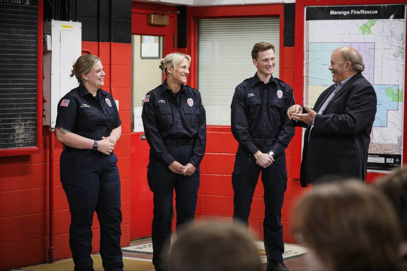 John Cederlund, far right, thanks Marengo Fire & Rescue Districts firefighters at the ceremony on May 28, 2025.